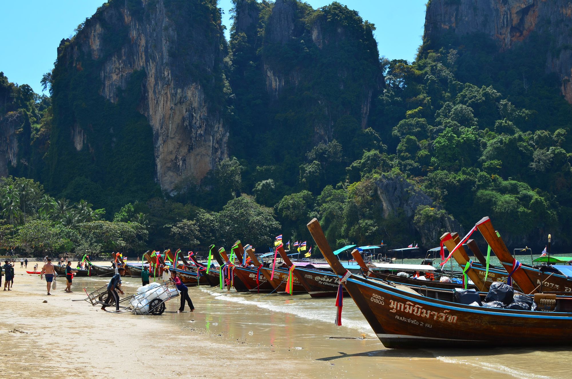 The fleet of boats that take visitors to and from Railay Beach