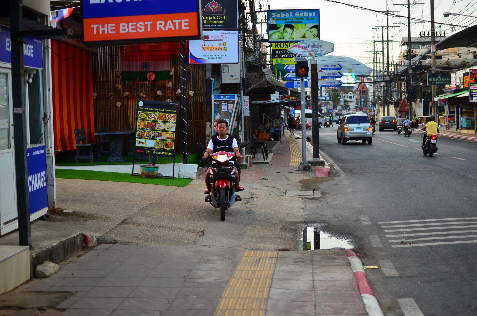 Driving a scooter the wrong way up the sidewalk