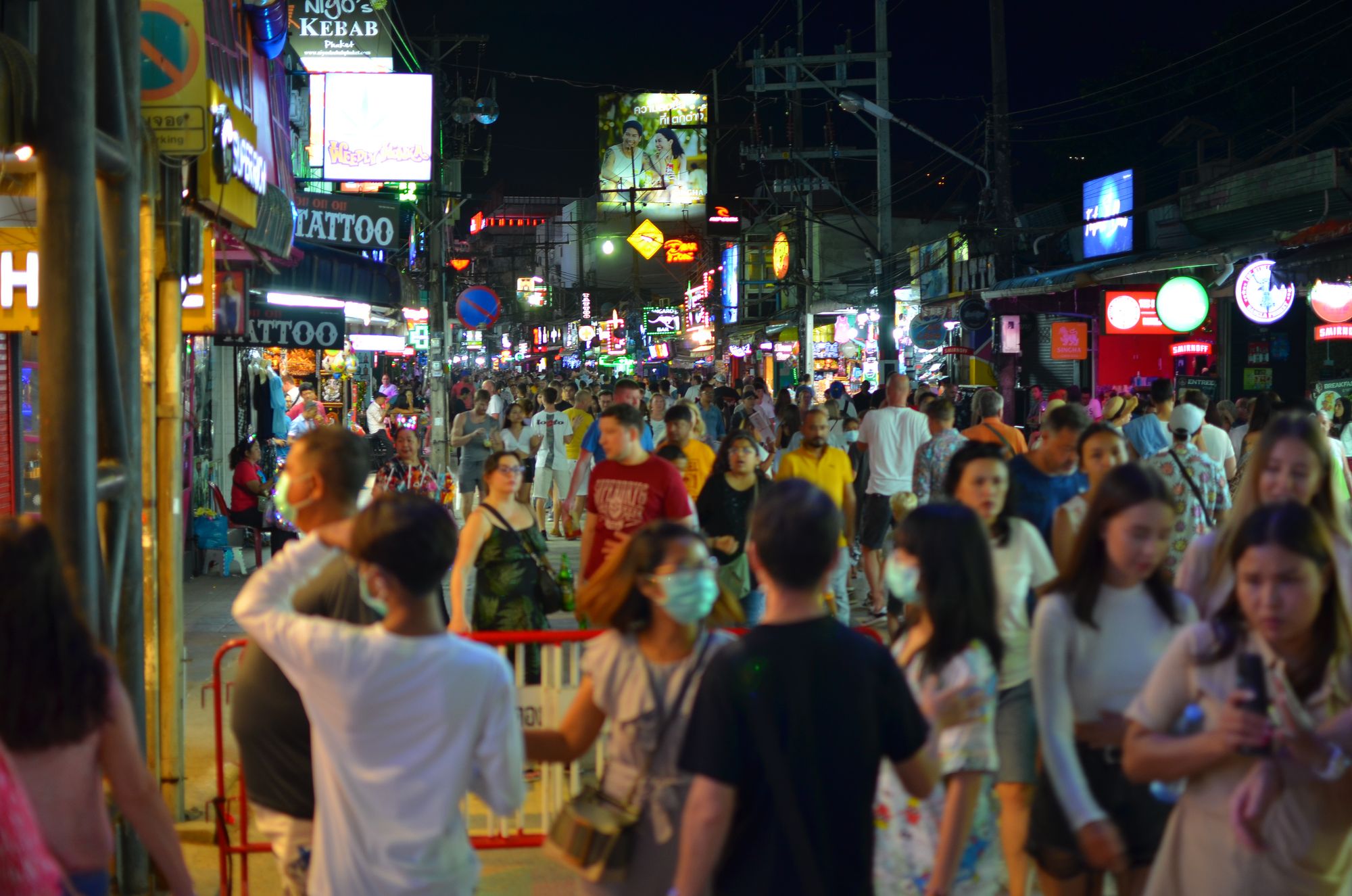 People walking around at night in Patong